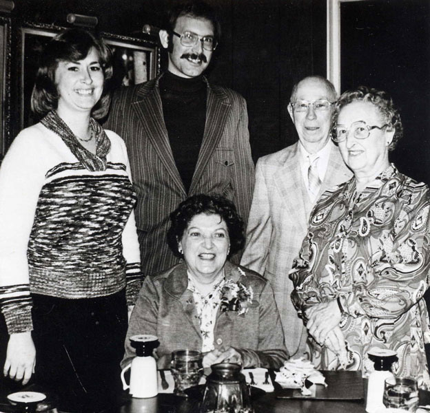 Group standing next to each other during transfer of Main Street Theatre. From left, Mary Douvier, Bob Douvier, Bev Gray, Freeman Parson, Helen Parson.